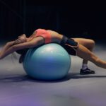 Bodyweight Fitness - woman doing yoga on stability ball