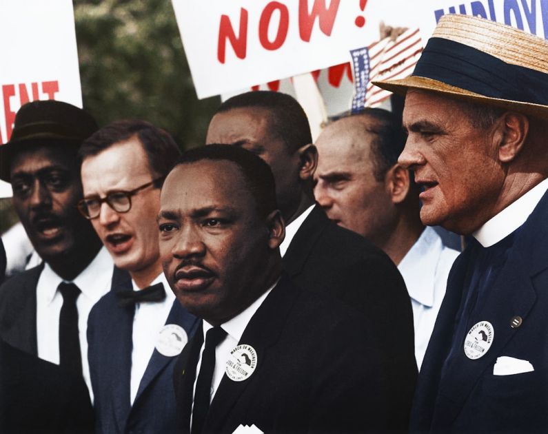 Progress Safely - Dr. Martin Luther King, Jr. and Mathew Ahmann in a crowd of demonstrators at the March on Washington