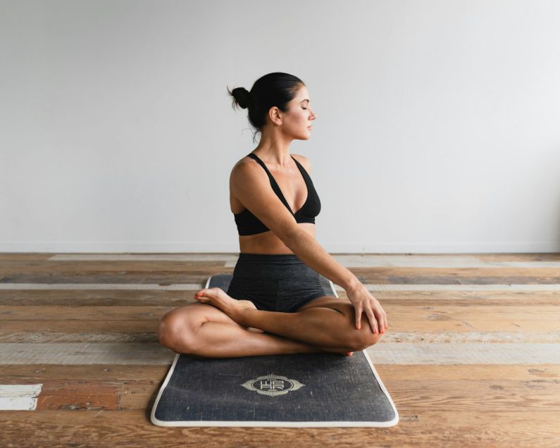 Virtual Fitness - woman performing yoga